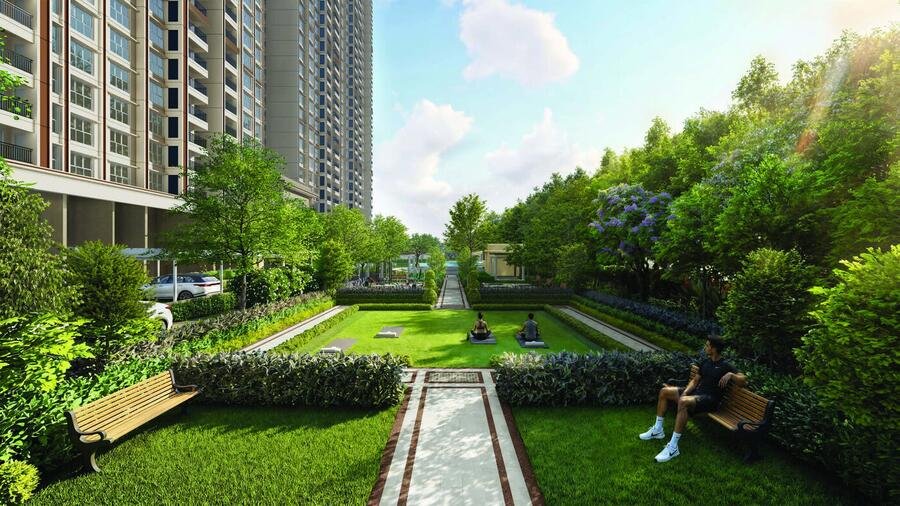 Godrej Regent Park landscaped garden walkway with towers in the background